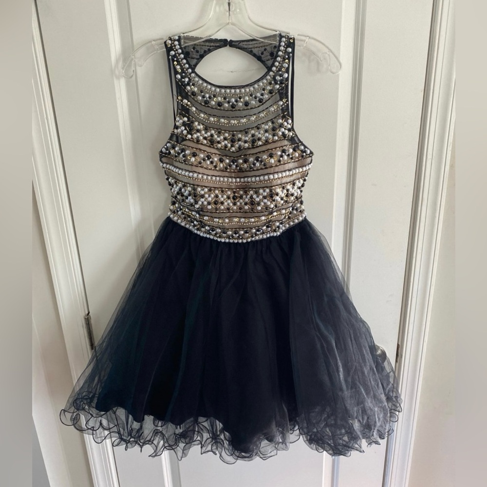 Brand new short dress with key hole back